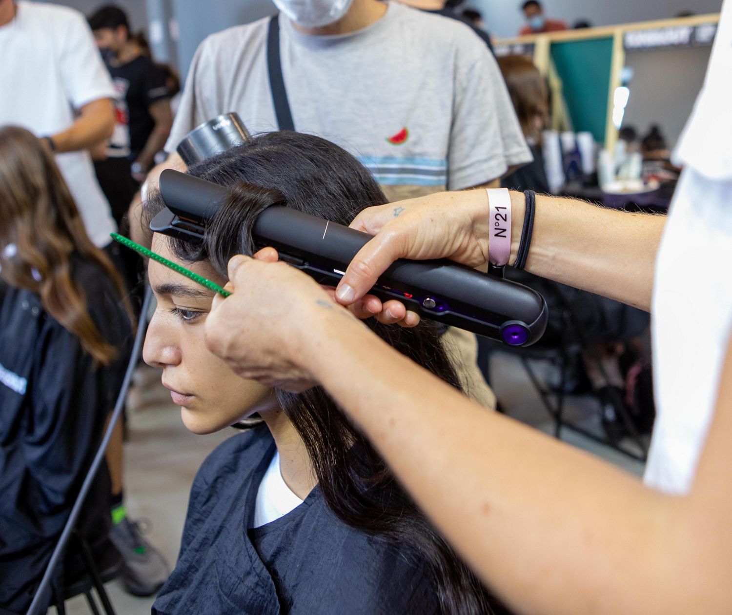 The Dyson Corrale straightener being used at Milan Fashion Week.